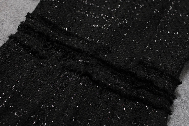 Svart V-ringad Tweedklänning