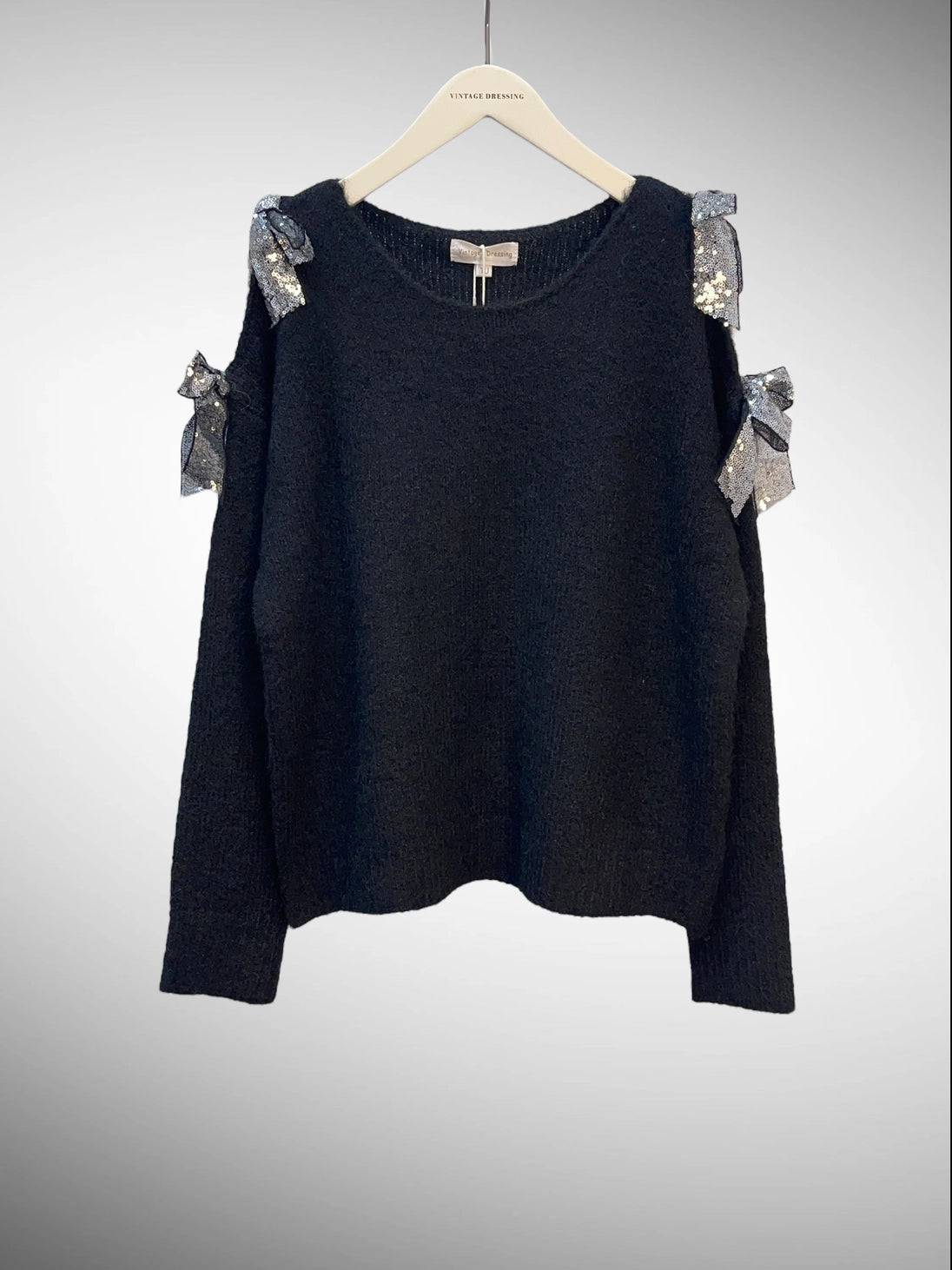 Tröja i Ullmix med Öppna Axlar och Glittrande Rosetter