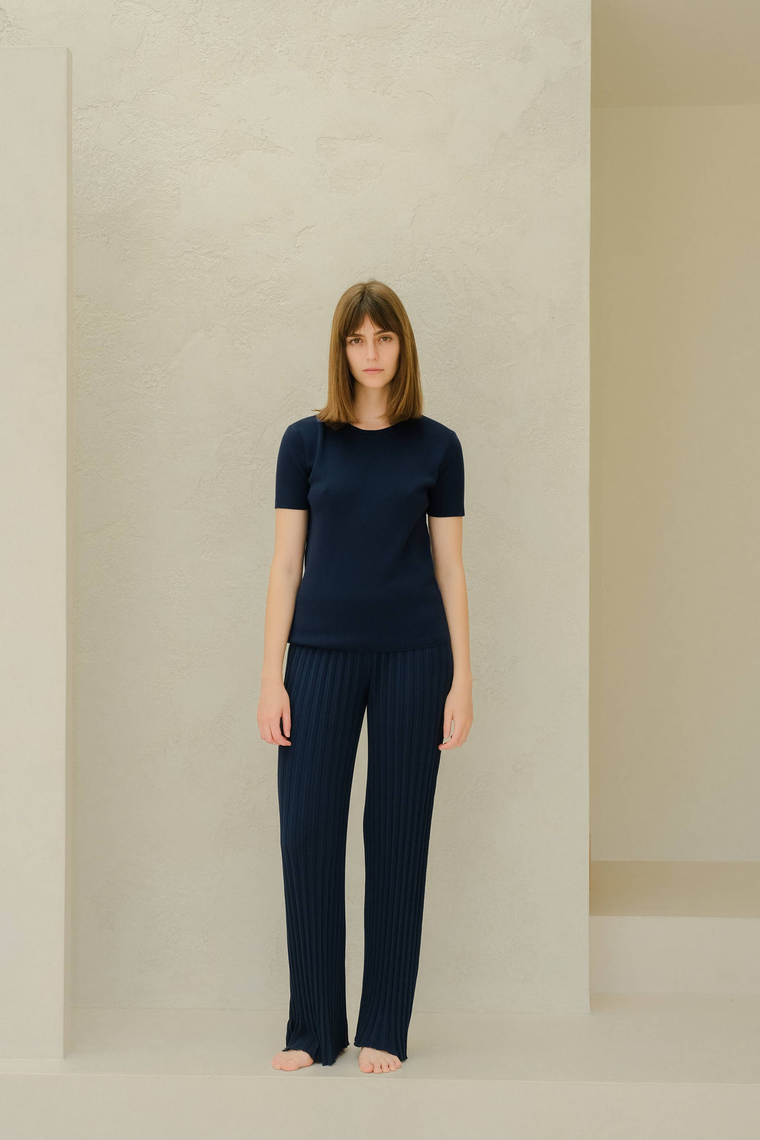 Plisserade stickade byxor i kammad bomull | Lèmme