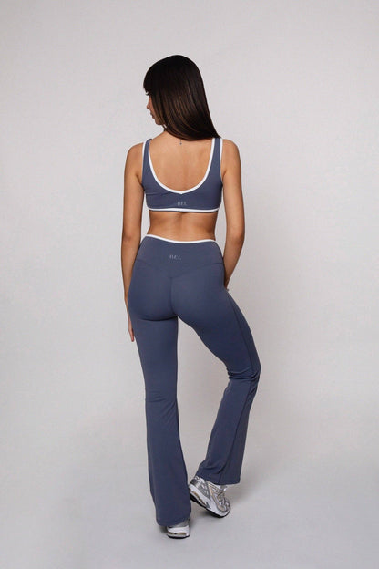 Flare Leggings med Korsad Midja - Ace Collection