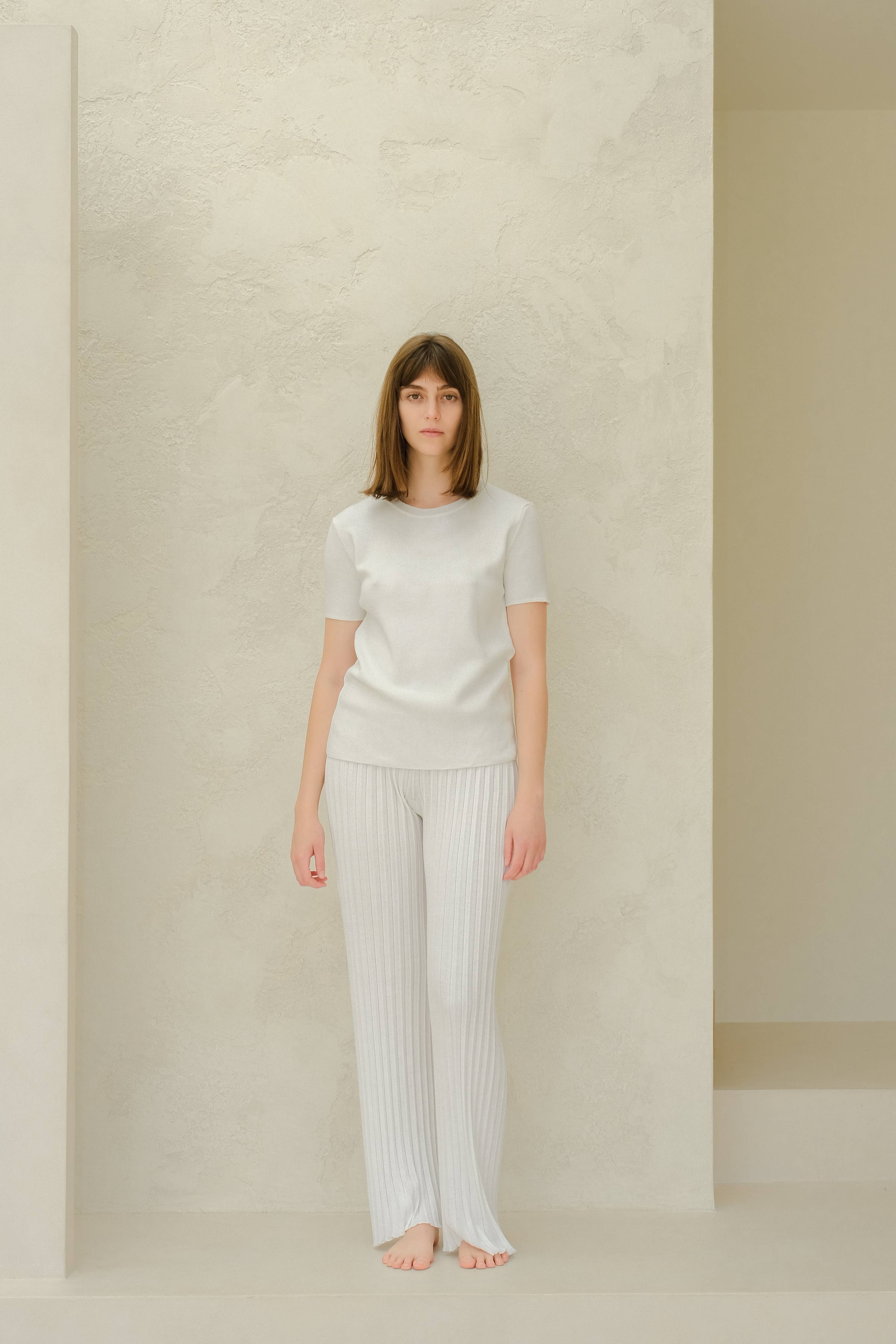 Plisserade stickade byxor i kammad bomull | Lèmme