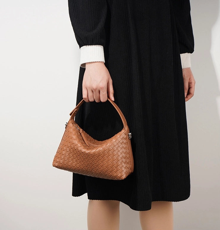 Woven leather bag made of recycled genuine leather 