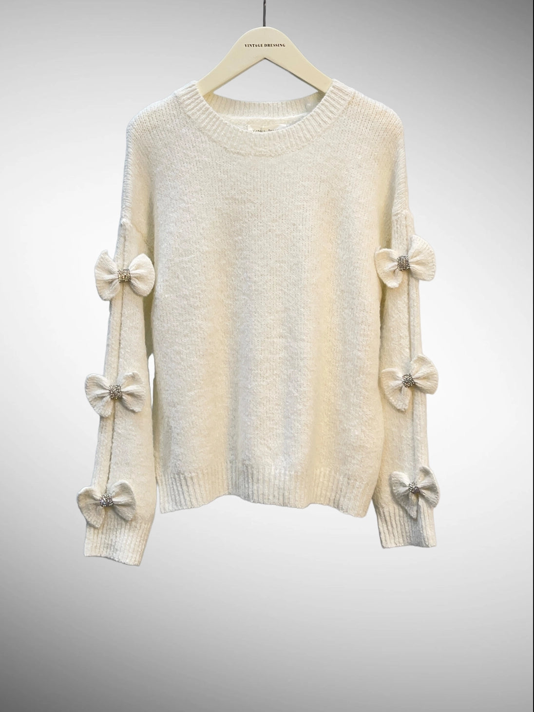 Pull en maille mélangée de laine avec nœuds et strass