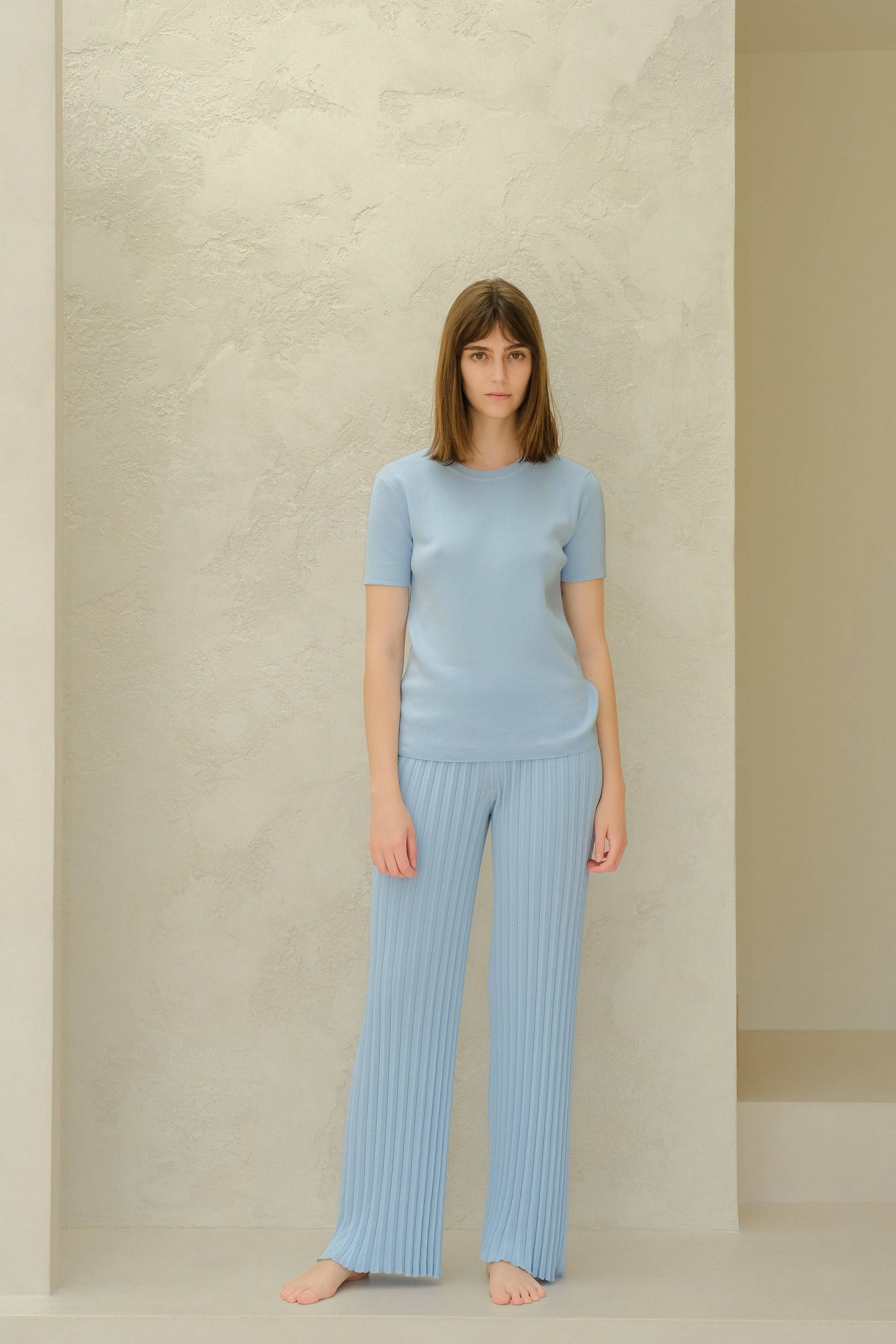 Plisserade stickade byxor i kammad bomull | Lèmme