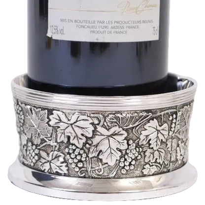 Anikt underlägg för vinflaskor