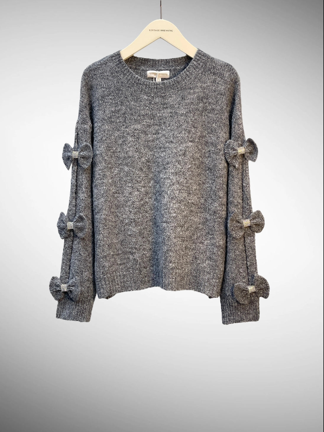 Pull en maille mélangée de laine avec nœuds et strass